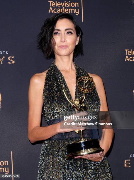 Casting director Carmen Cuba poses in the press room at the 2017 Creative Arts Emmy Awards at Microsoft Theater on September 10, 2017 in Los Angeles,...
