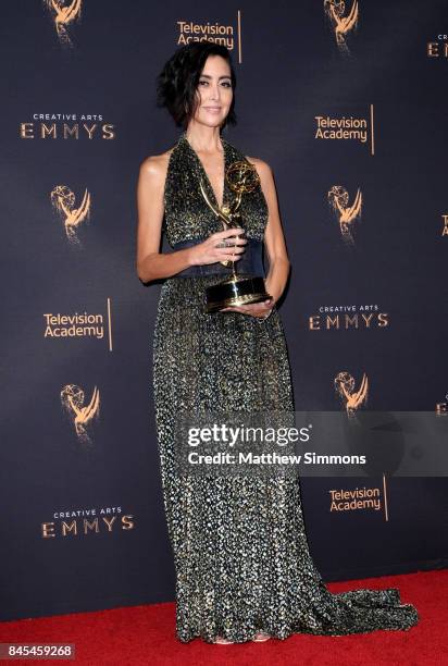 Casting director Carmen Cuba poses in the press room at the 2017 Creative Arts Emmy Awards at Microsoft Theater on September 10, 2017 in Los Angeles,...