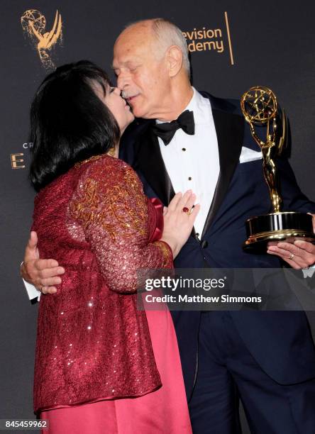 Actors Delta Birke and Gerald McRaney pose in the press room at the 2017 Creative Arts Emmy Awards at Microsoft Theater on September 10, 2017 in Los...