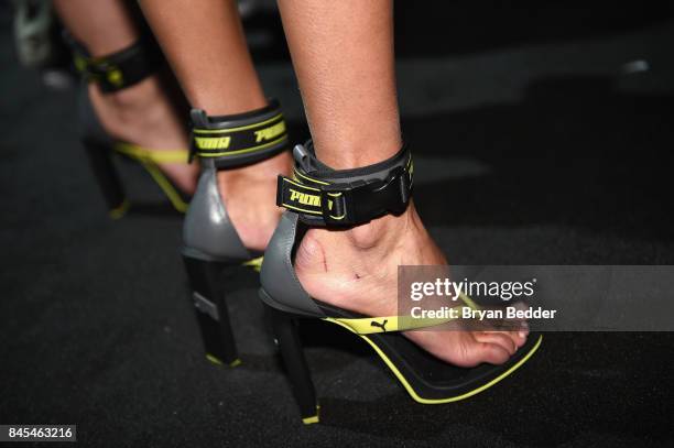 Model, shoe detail, prepares backstage at the FENTY PUMA by Rihanna Spring/Summer 2018 Collection at Park Avenue Armory on September 10, 2017 in New...