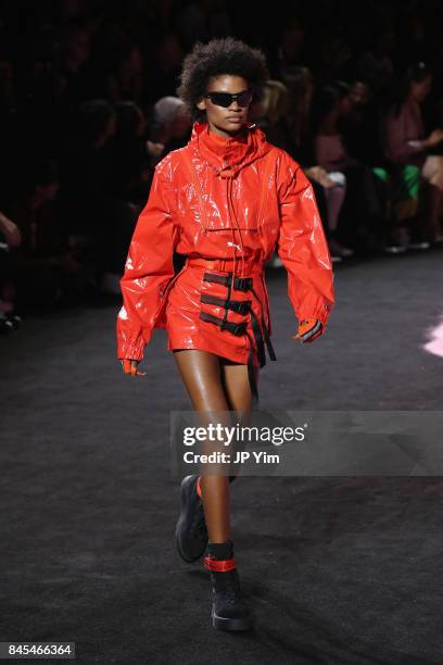 Model walks the runway wearing Look 22 at the FENTY PUMA by Rihanna Spring/Summer 2018 Collection at Park Avenue Armory on September 10, 2017 in New...