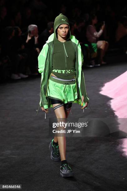 Model walks the runway wearing Look 36 at the FENTY PUMA by Rihanna Spring/Summer 2018 Collection at Park Avenue Armory on September 10, 2017 in New...