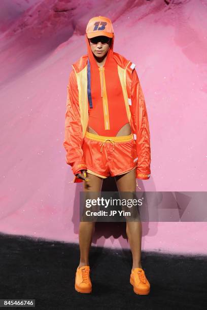 Dilone walks the runway wearing Look 26 at the FENTY PUMA by Rihanna Spring/Summer 2018 Collection at Park Avenue Armory on September 10, 2017 in New...