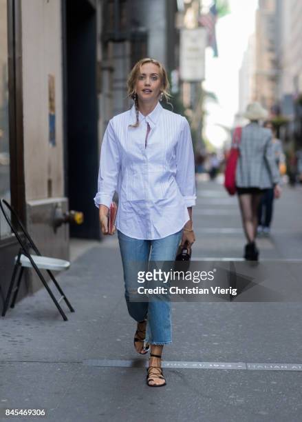 Laurel Pantin wearing white button shirt, denim jeans seen in the streets of Manhattan outside Victoria Beckham during New York Fashion Week on...