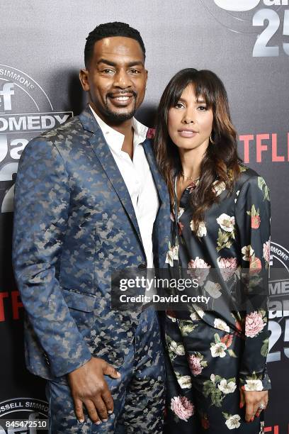 Bill Bellamy and Kristen Baker Bellamy attend Netflix Presents Def Comedy Jam 25 at The Beverly Hilton Hotel on September 10, 2017 in Beverly Hills,...