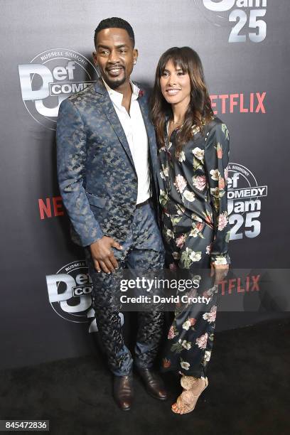 Bill Bellamy and Kristen Baker Bellamy attend Netflix Presents Def Comedy Jam 25 at The Beverly Hilton Hotel on September 10, 2017 in Beverly Hills,...