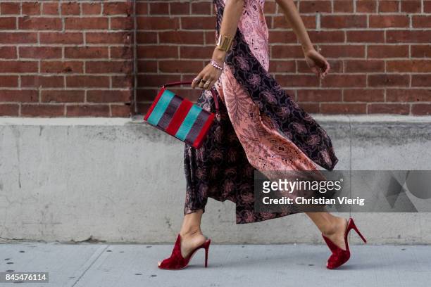 Aimee Song wearing a silk dress seen in the streets of Manhattan outside Diane von Furstenberg during New York Fashion Week on September 10, 2017 in...