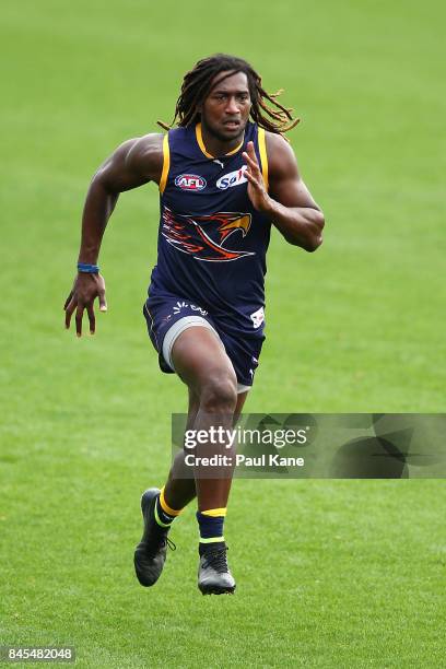 Nic Naitanui works on running drills during a West Coast Eagles AFL training session at Domain Stadium on September 11, 2017 in Perth, Australia.