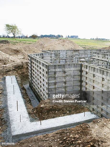 concrete forms creating basement walls - unfinished basement stock pictures, royalty-free photos & images