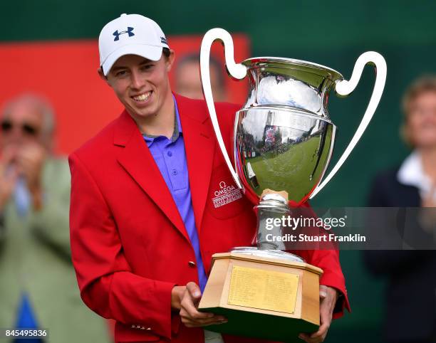 Matthew Fitzpatrick of England holds the winners trophy after the final round of the Omega European Masters at Crans-sur-Sierre Golf Club on...