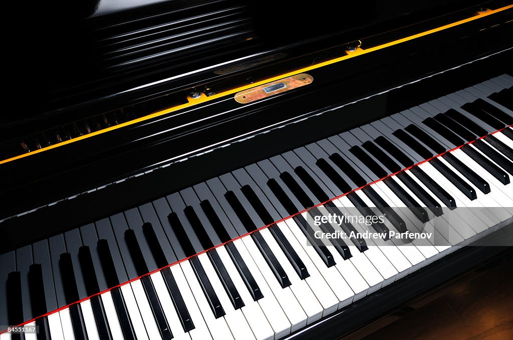 Beautiful grand piano keyboard up close.