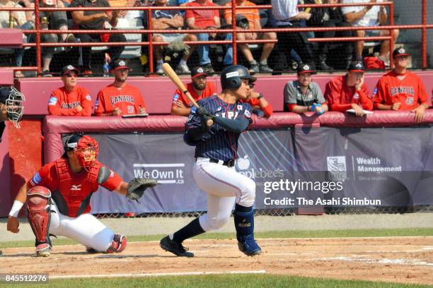 Kotaro Kiyomiya of Japan hits a RBI single in the 3rd inning during the WBSC U-18 Baseball World Cup Bronze Medal Game between Japan and Canada at...