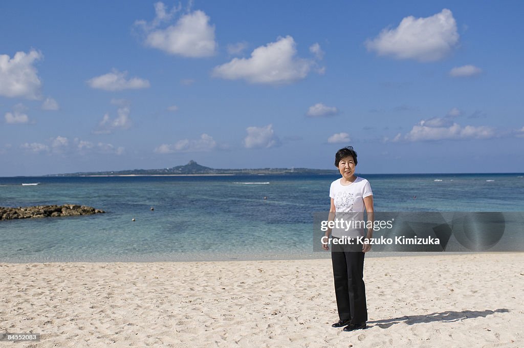 Senior woman on the beach,smiling