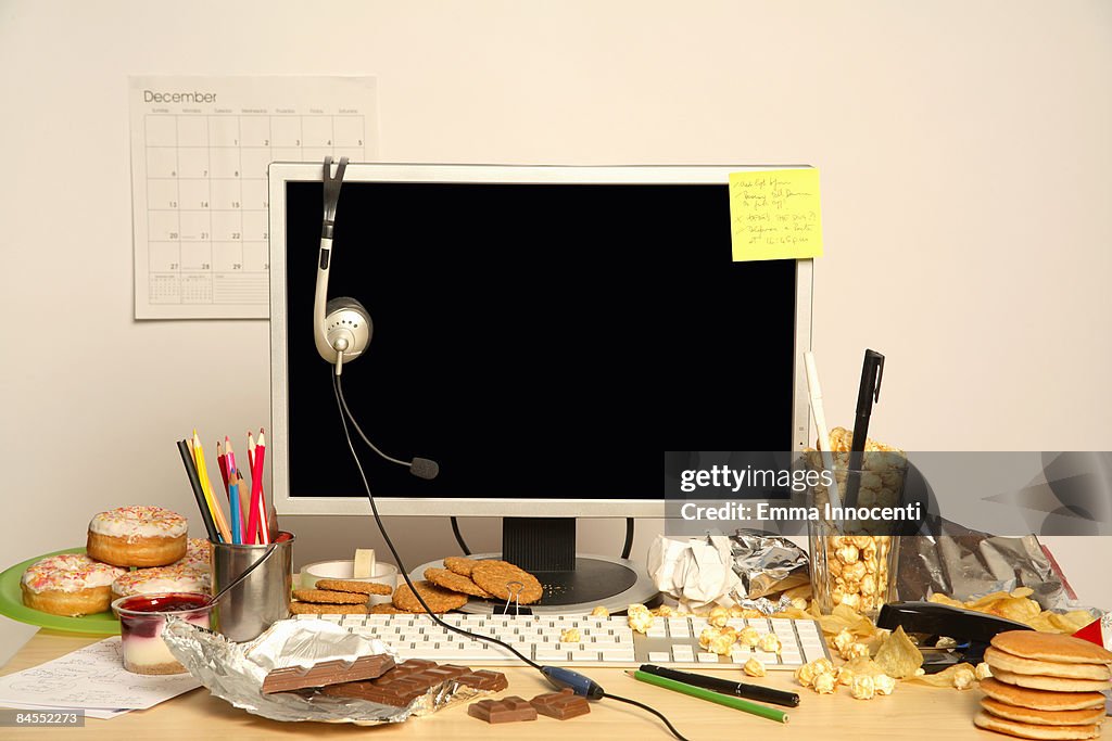 Food Over Computer Computer Desk Surrounded By Junk Food High-Res Stock Photo - Getty Images
