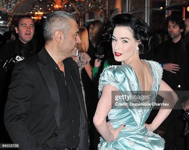 Dita Von Teese and Designer Elie Saab attend the Fashion Dinner for Aids at the Pavillon d'Armenonville on January 29, 2009 in Paris, France.