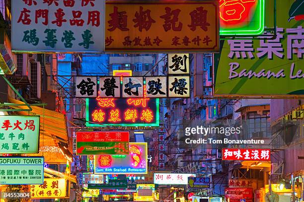 neon signs,nathan rd, kowloon district, hong kong - kowloon peninsula stock pictures, royalty-free photos & images
