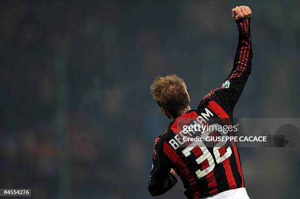 Milan's English midfielder David Beckham celebrates scoring against Genoa during their Italian Serie A football match on January 28, 2009 at San Siro...