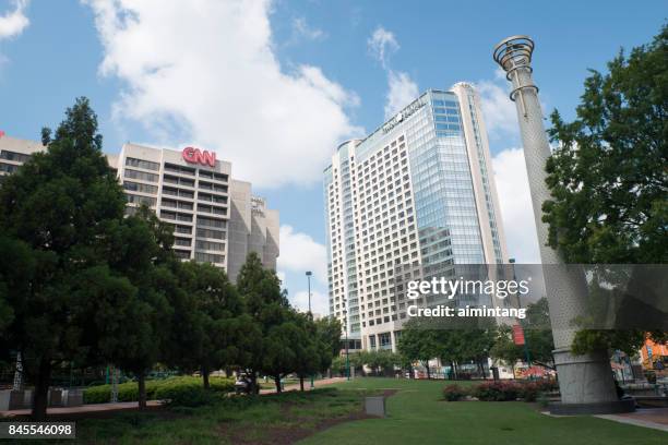 cnn and omni hotel in atlanta - centennial park atlanta stock pictures, royalty-free photos & images