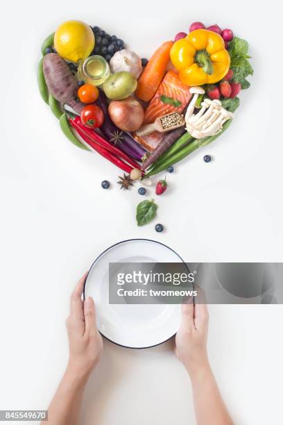 flat lay conceptual vegan food on white background. - antioxidant 個照片及圖片檔