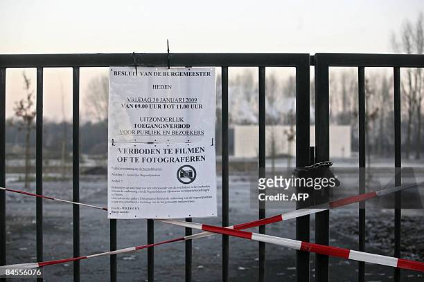 Police sign advising that it is forbidden to film or take pictures at the funeral of baby Korneel, one of the victims of the Dendermonde knife...