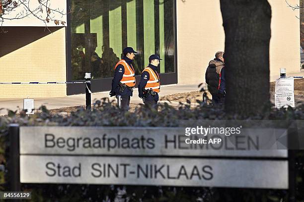 Police stand guard during the funeral of baby Korneel, one of the victims of the Dendermonde knife attack, is pictured on January 30, 2009 in...