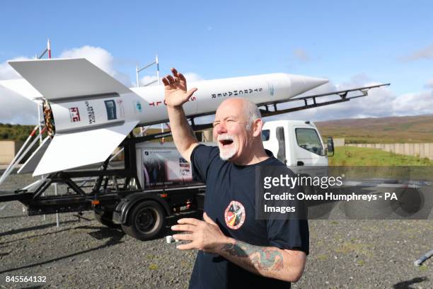 Steve Bennett of Starchaser Industries stands next to Britain's biggest reusable rocket Skybolt 2, which stands 8.3m tall, priior to its launch by...