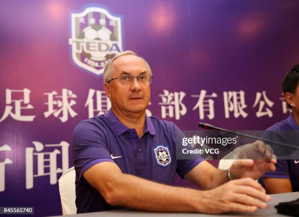 The new head coach of China's Tianjin Teda Uli Stielike attends a press conference on September 11, 2017 in Tianjin, China.