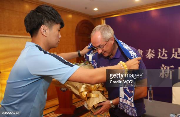 The new head coach of China's Tianjin Teda Uli Stielike attends a press conference on September 11, 2017 in Tianjin, China.