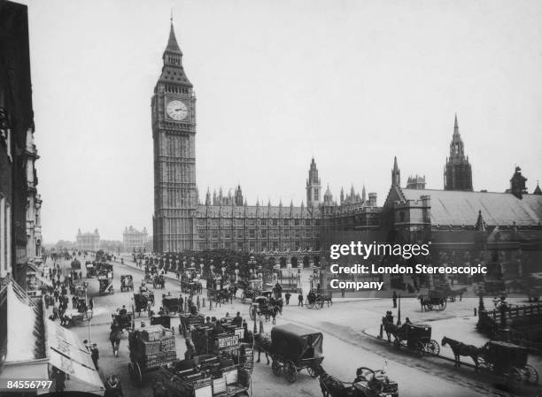 The Palace of Westminster and Big Ben seen from Parliament Square, London, circa 1897.