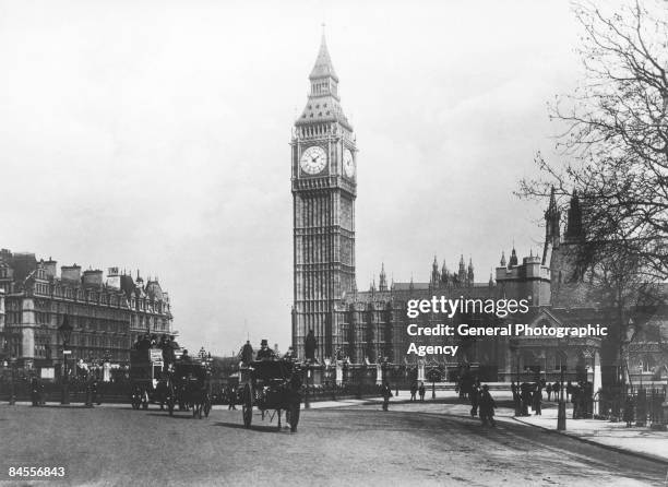 The Houses of Parliament and Big Ben seen from Parliament Square, London, circa 1900.