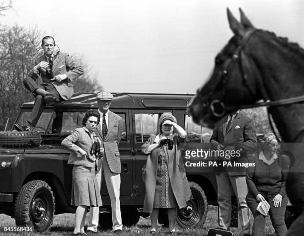 Prince Philip, the Duke of Edinburgh, perches on the roof of a Land Rover but Queen Elizabeth II , the Queen Mother and Duke of Beaufort prefer a...