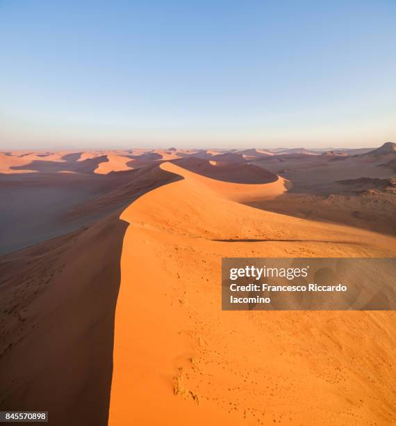 aerial view over the namib desert, sossusvlei sand dunes, namibia, africa - iacomino namibia stock pictures, royalty-free photos & images