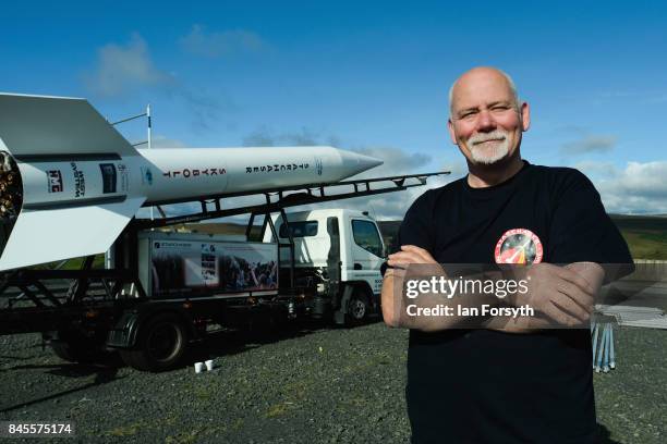 Managing Director of Starchaser Steve Bennett stands next to the Skybolt 2 Research Rocket as final preparations are made ahead of the launch from...