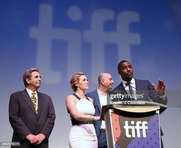 Actors Beau Bridges, Kate Winslet, director Hany Abu-Assad and actor Idris Elba onstage during the introduction of "The Mountain Between Us" during...