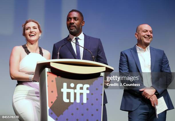 Actors Kate Winslet and Idris Elba with director Hany Abu-Assad during the introduction of "The Mountain Between Us" during the 2017 Toronto...