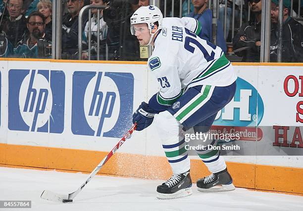Alexander Edler of the Vancouver Canucks handles the puck during an NHL game against the San Jose Sharks on January 20, 2009 at HP Pavilion at San...