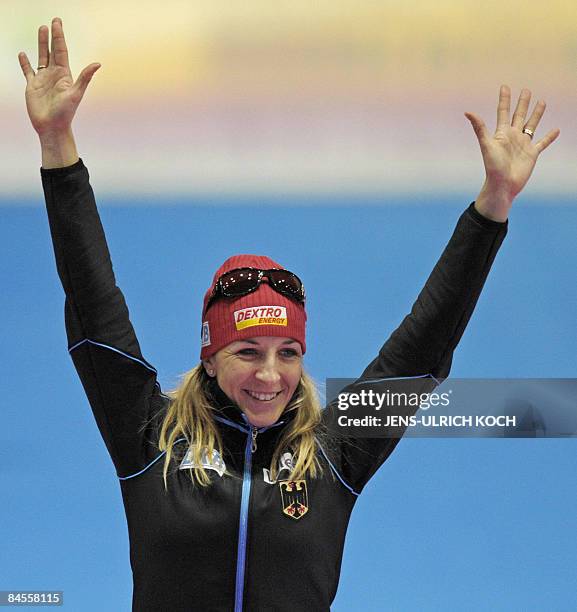 Germany's skater Anni Friesinger celebrates winning the woman 1500m race at the ISU Speed Skating World Cup on January 30, 2009 in the eastern German...