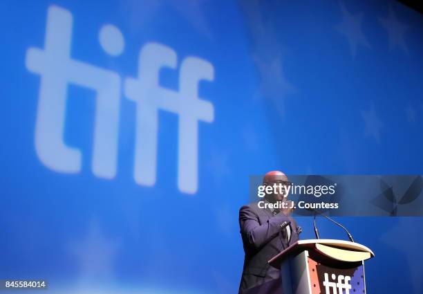 Artisitic Director Cameron Bailey speaks during the introduction of "The Mountain Between Us" during the 2017 Toronto International Film Festival at...