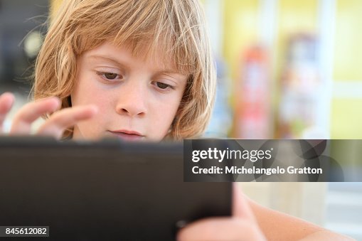 Young boy using tablet Young boy using tablet