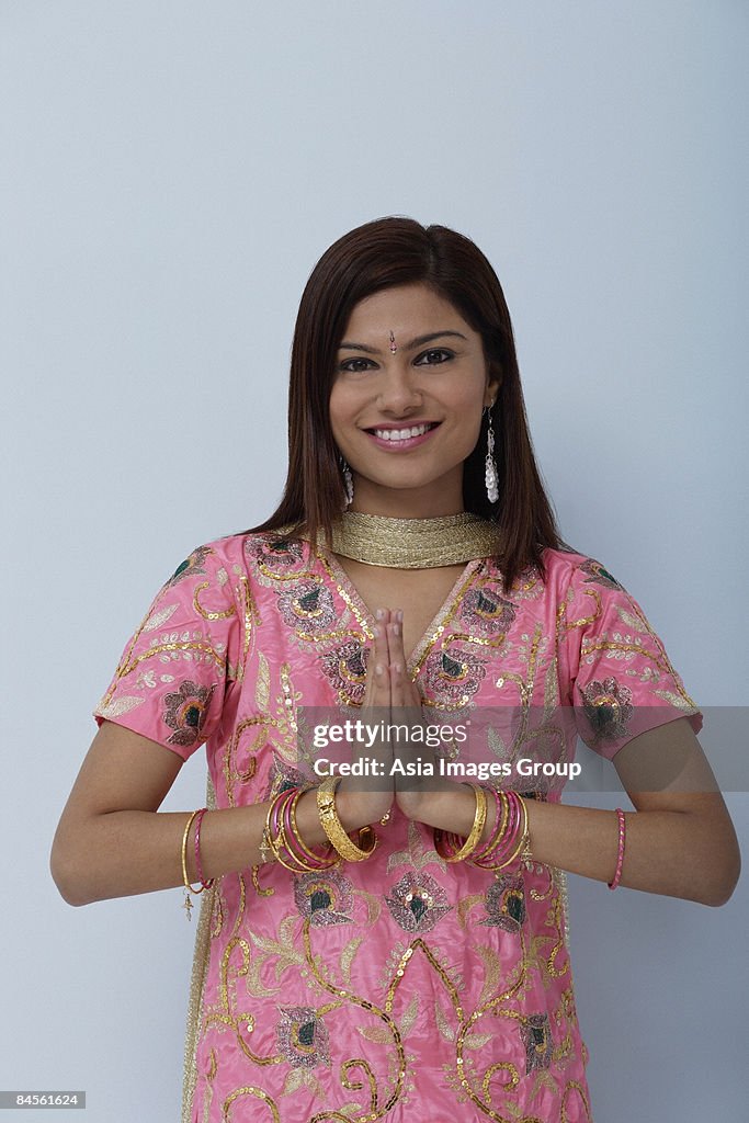 Young woman dressed in traditional Indian clothing (salwar kameez)