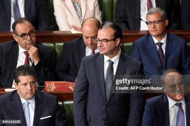 Tunisian nominated health minister Slim Chaker attends a parliamentary session ahead of a vote of confidence in the prime minister's reshuffled...