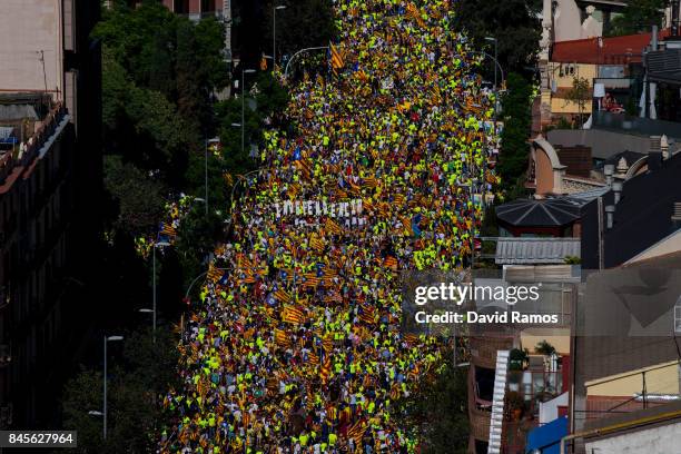 People march during a demonstration celebrating the Catalan National Day on September 11, 2017 in Barcelona, Spain. The Spanish Northeastern...