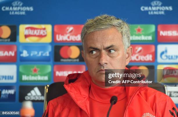 Manchester United's Portuguese manager Jose Mourinho attends a press conference at at Old Trafford in Manchester, north-west England on September 11...