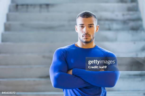 young, muscular, mixed race man - male bodybuilder pose stock pictures, royalty-free photos & images