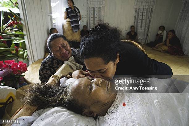 Tongan women mourn at the funeral of Kalisi Lolohea Paonga on April 4, 2007 in the village of Pangai, on the island of Ha'apai, Tonga. Tonga is one...