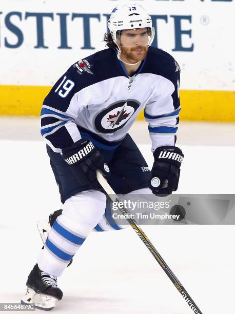 Jim Slater of the Winnipeg Jets plays in the game against the Tampa Bay Lightning at Amalie Arena on March 14, 2015 in Tampa, Florida.