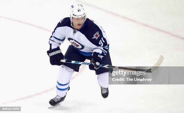 Jiri Tlusty of the Winnipeg Jets plays in the game against the Tampa Bay Lightning at Amalie Arena on March 14, 2015 in Tampa, Florida.