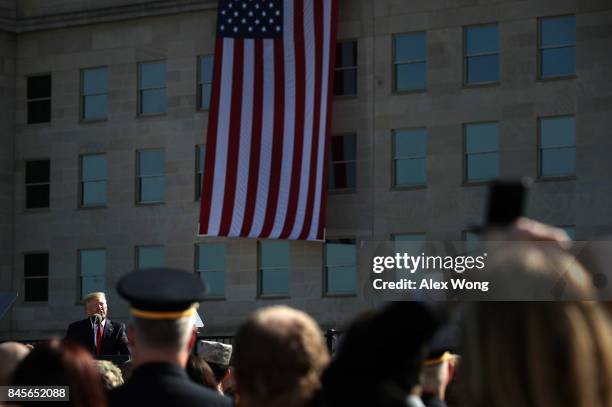 President Donald Trump speaks during an observance to commemorate the anniversary of the 9/11 terror attacks at the Pentagon Memorial September 11,...