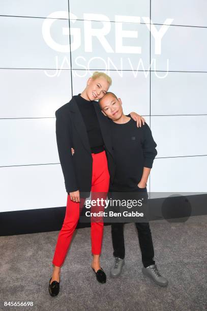 Model Karlie Kloss and designer Jason Wu attend the Grey Jason Wu Presentation during New York Fashion Week at the Cadillac House on September 11,...