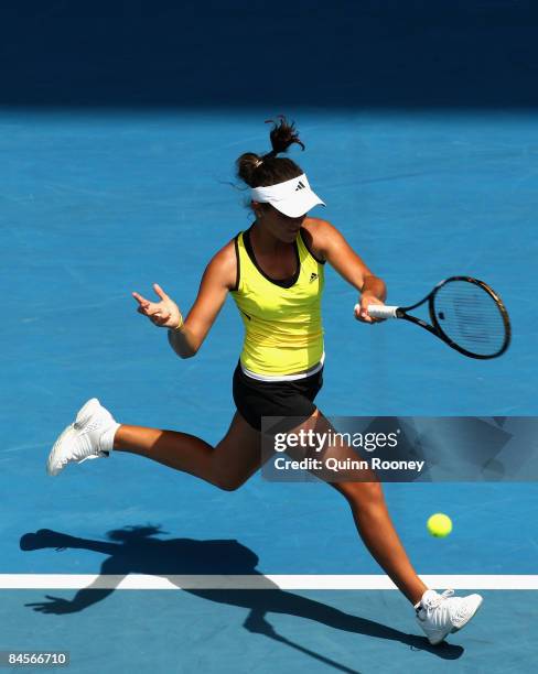 Laura Robson of Great Britain plays a forehand in her junior girls final match against Ksenia Pervak of Russia during day thirteen of the 2009...